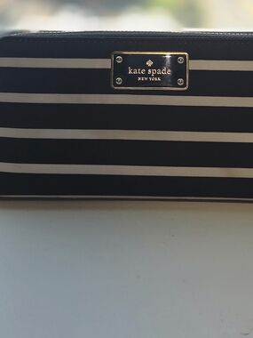 kate spade Black and White Striped Zip Wallet with Gold Plaque